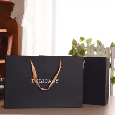 Portable Tote Cardboard Paper Bag Luxury Clothing Garment paper bag